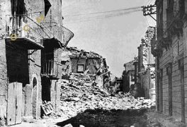 Incrocio - Via Cairoli con via Marconi - Un palazzo colpito da una bomba d'aereo